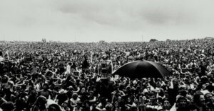 A crowd of people at the iconic woodstock concert.
