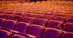 Rows of theatre seats.