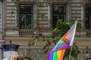 rainbow pride flag on a city street