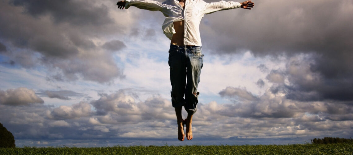 man flying freedom yoga meditation